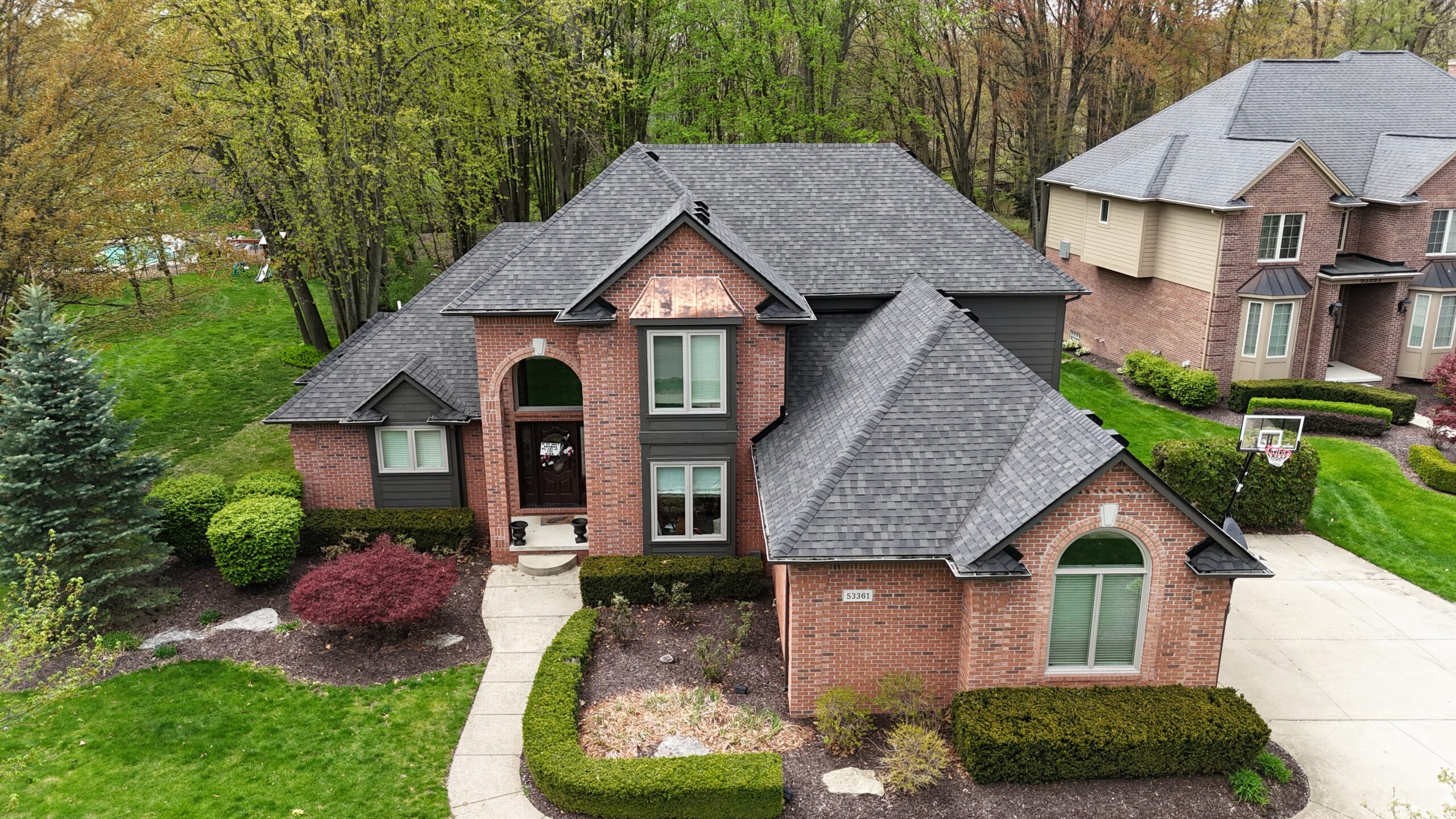 Residential roof replacement project in Metro Detroit, MI — Roofcom (#17)