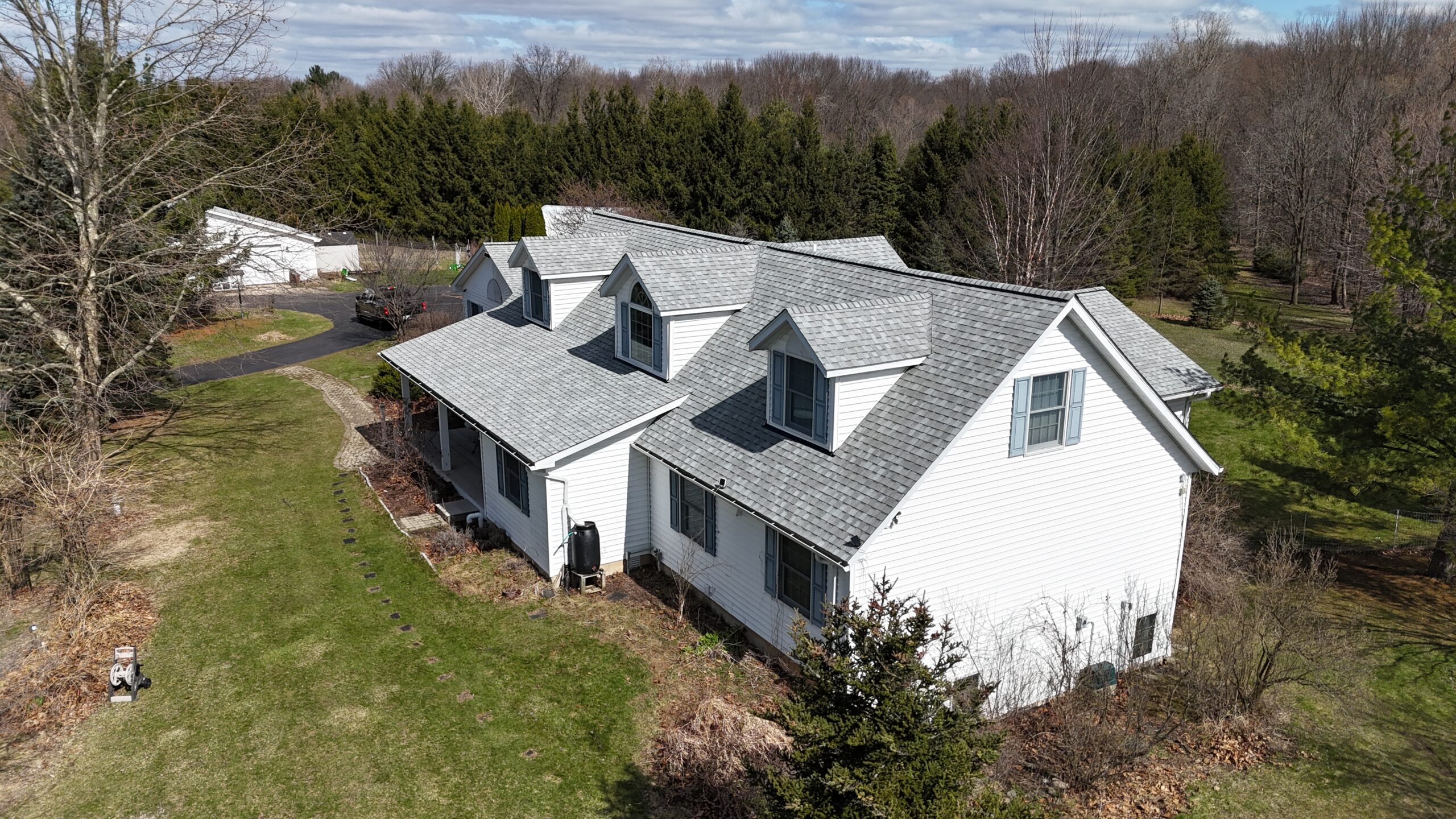 Residential roof replacement project in Metro Detroit, MI — Roofcom (#33)